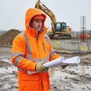 Premium High Visibility Unlined Storm Coat in Vibrant Orange for Enhanced Safety and Comfort