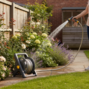 Premium Compact Freestanding Hose Reel with 25m Multi-Purpose Hose, Adjustable Nozzle, and Connectors for Easy Gardening