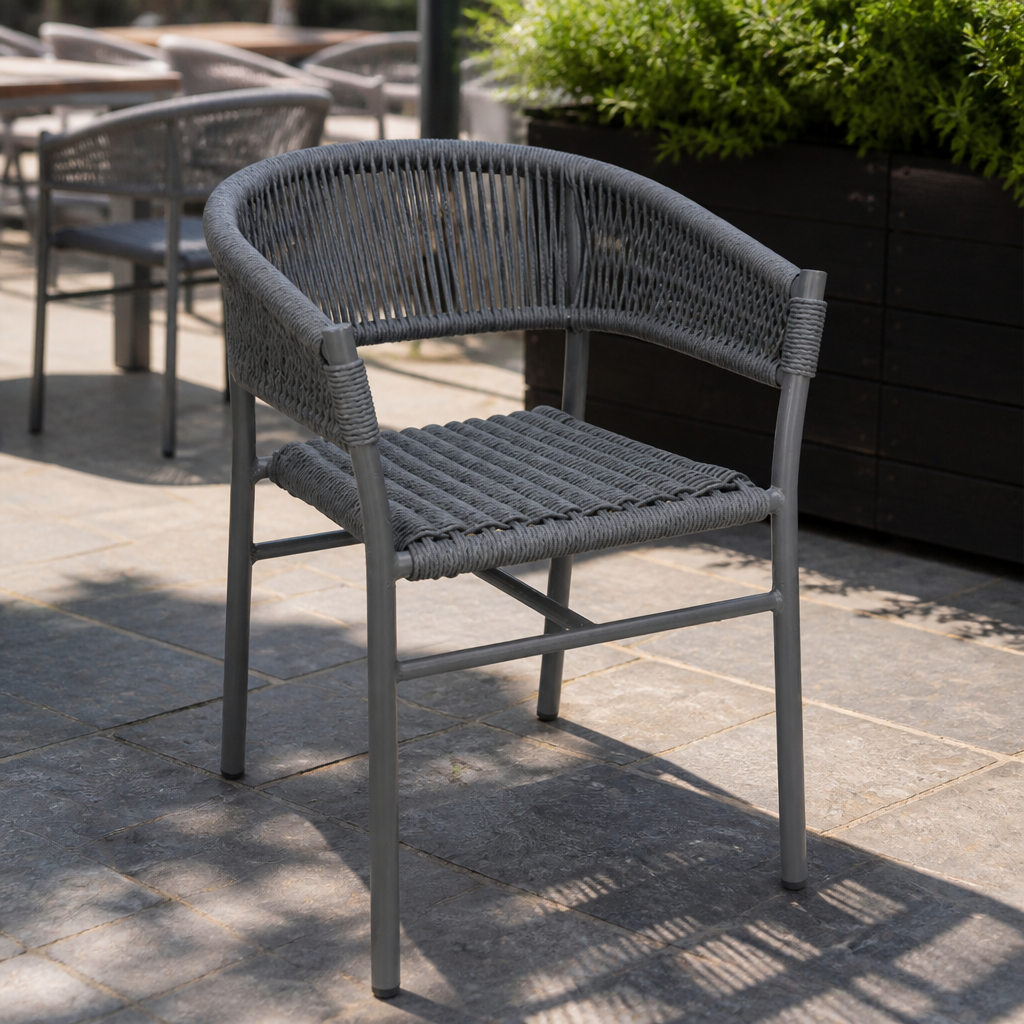 Pack of two grey stackable outdoor wicker chairs
