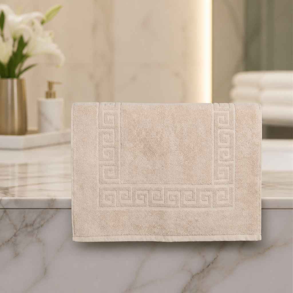 Beige 500mm commercial bath mat with Grecian key design